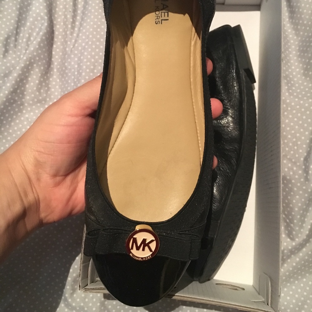 Michael Kors flats.